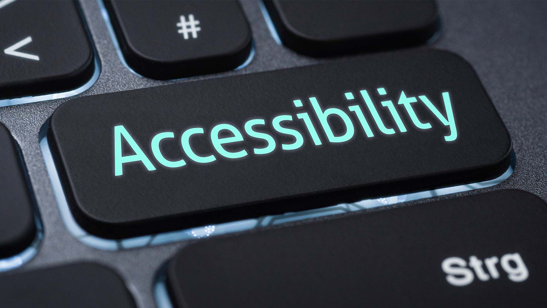 A glowing 'Accessibility' key on a keyboard.