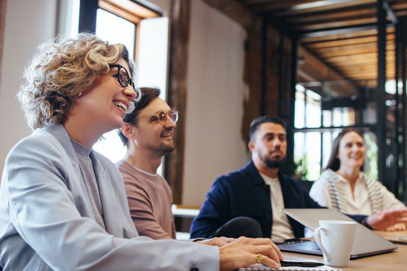 A group of professionals engaged in a meeting.